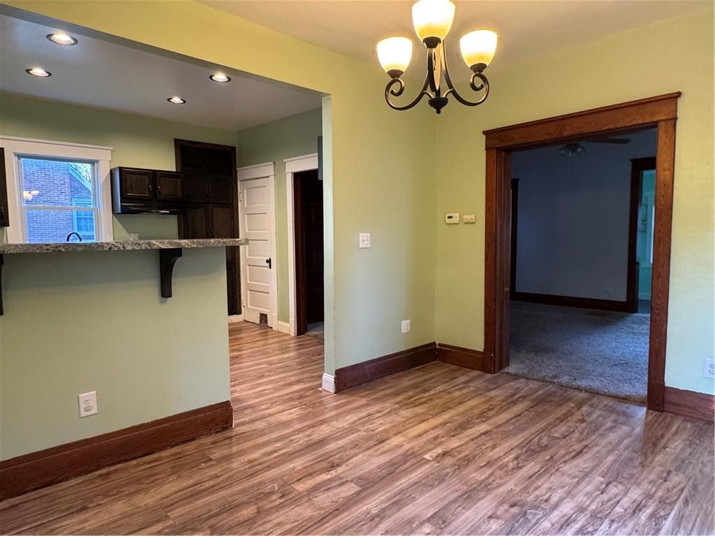 351 North Pitt Street Mercer, PA 16137 - Photo 16 of 39 a view of a room with wooden floor and staircase