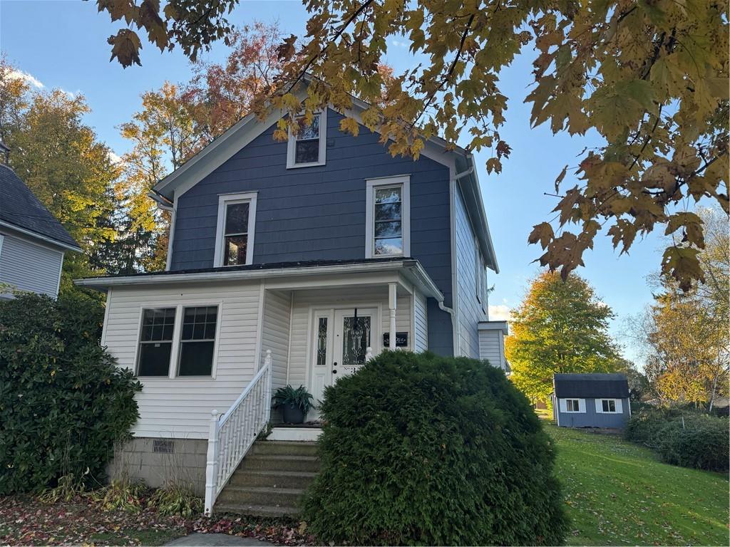 351 North Pitt Street Mercer, PA 16137 - Photo 2 of 39 a front view of a house with garden