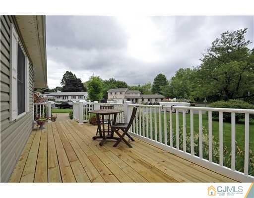 3028 Cheesequake Road Old Bridge, NJ 08859 - Photo 14 of 16 a view of a chairs on the roof deck