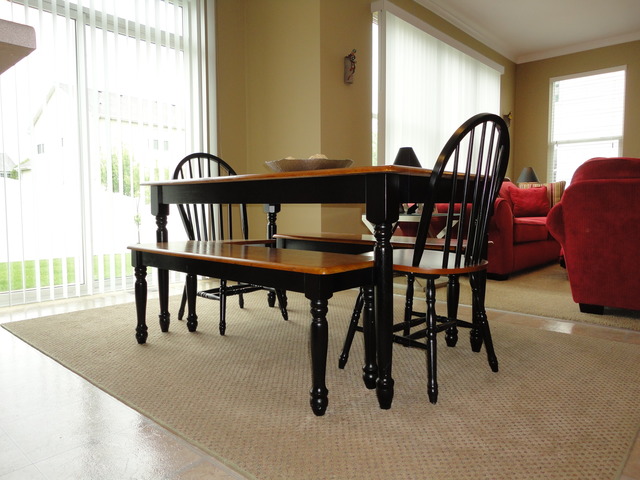 1407 Roth Drive Joliet, IL 60431 - Photo 12 of 25 a view of a dining room with furniture window and outside view