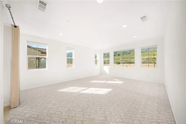 a view of a big room with closet and cabinet