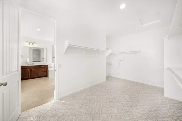 a view of empty room with windows