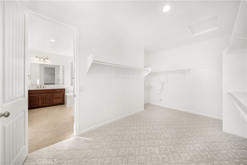 12210 Alamo Drive Rancho Cucamonga, CA 91739 - Photo 26 of 53 a view of a big room with closet and cabinet