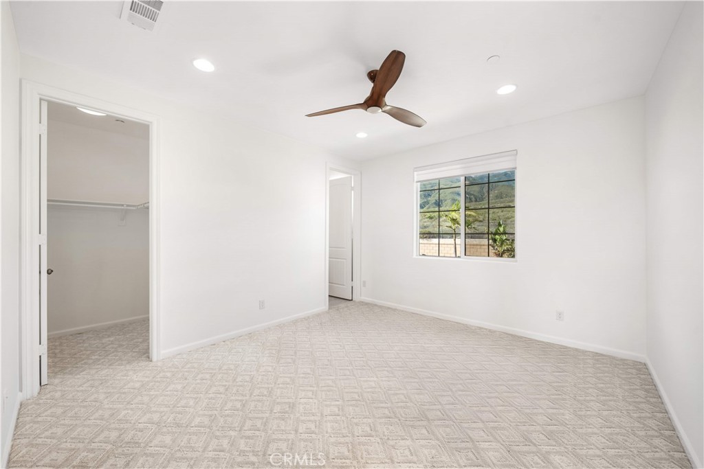 12210 Alamo Drive Rancho Cucamonga, CA 91739 - Photo 27 of 53 a view of an empty room with a window