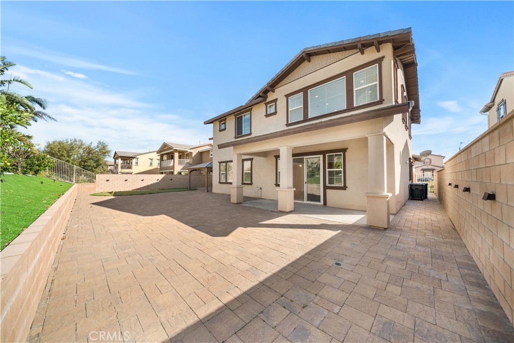 12210 Alamo Drive Rancho Cucamonga, CA 91739 - Photo 41 of 53 a view of a white building with a outdoor space