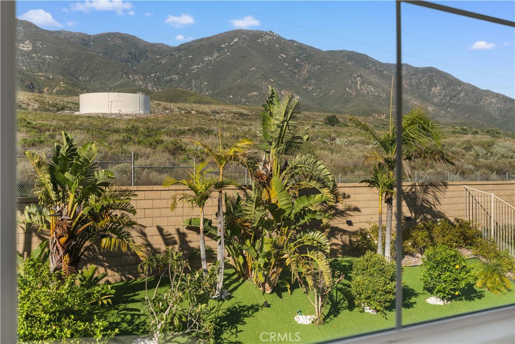 12210 Alamo Drive Rancho Cucamonga, CA 91739 - Photo 47 of 53 a view of a lake with a mountain in the background