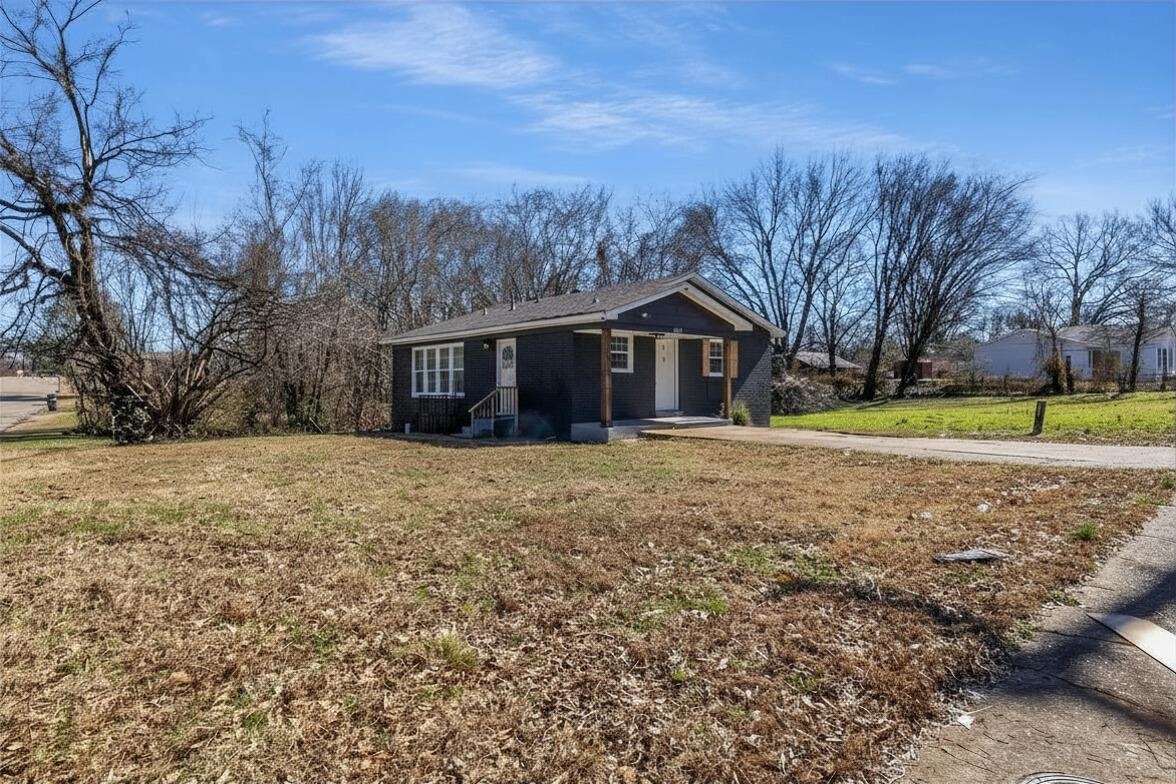 1532 Silver Street Memphis, TN 38106 - Photo 2 of 14 a view of house with outdoor space and garden