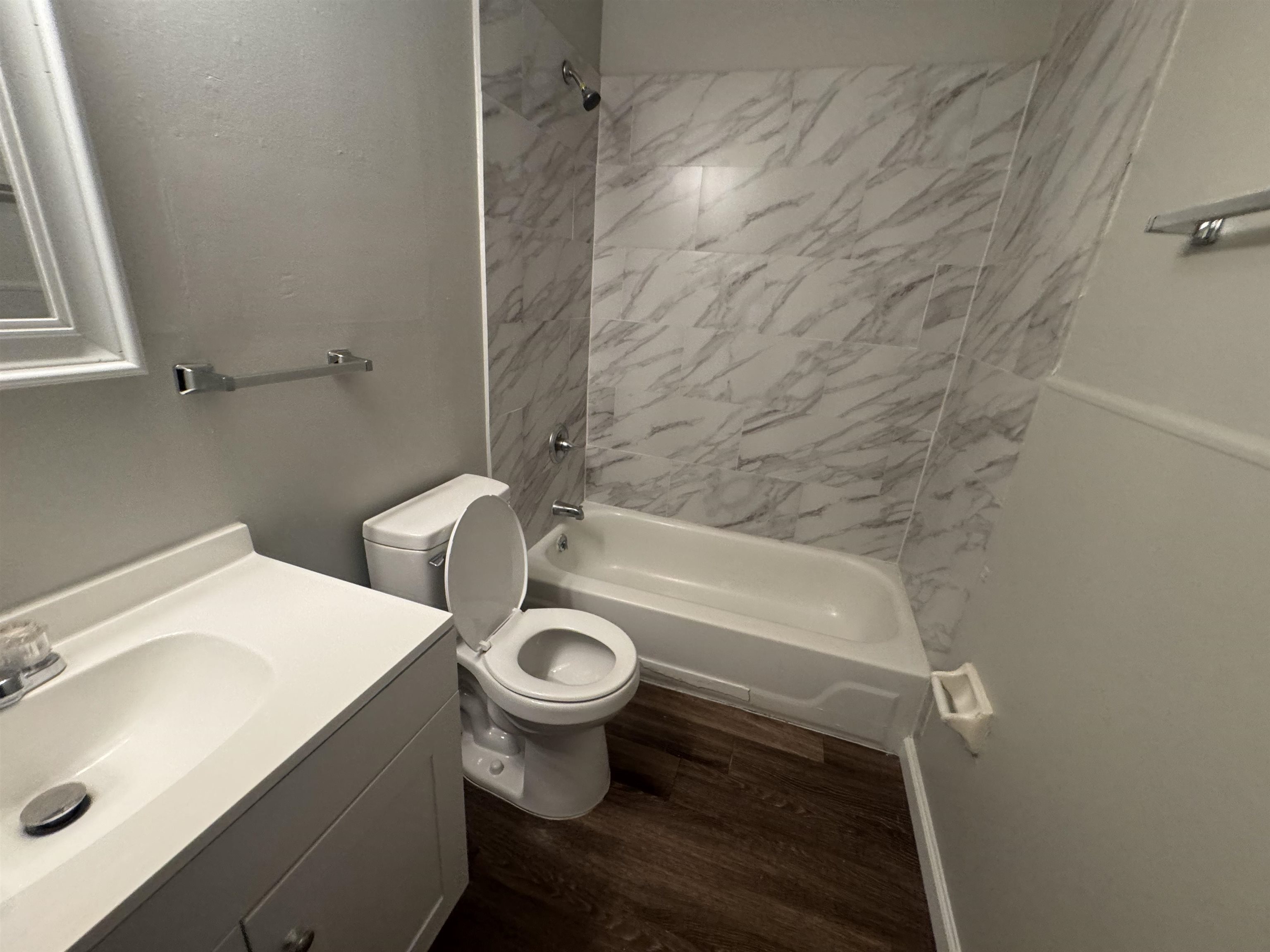 745 Harahan Road Memphis, TN 38109 - Photo 14 of 15 a bathroom with a sink and a mirror