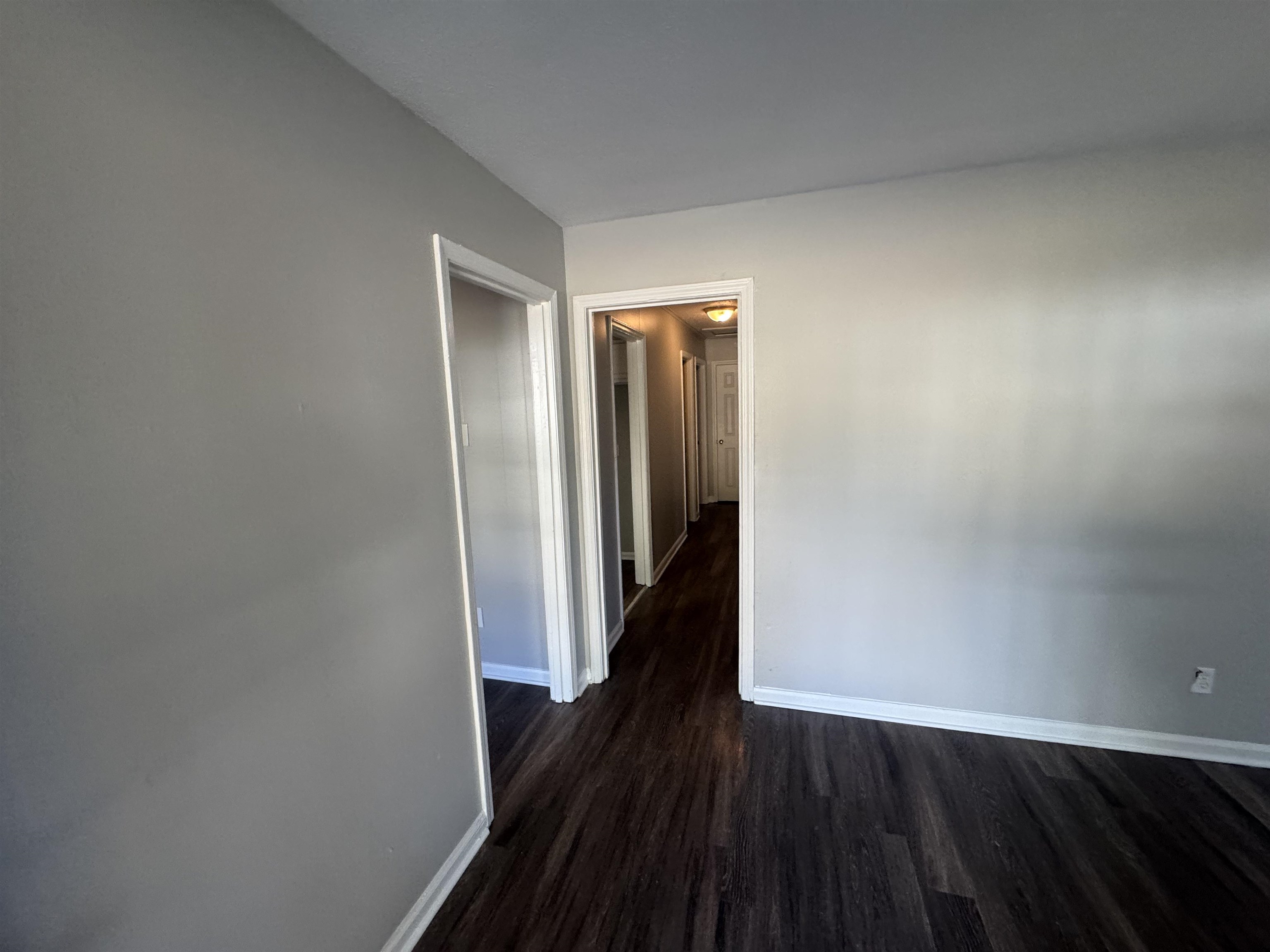 745 Harahan Road Memphis, TN 38109 - Photo 2 of 15 a view of a hallway with wooden floor