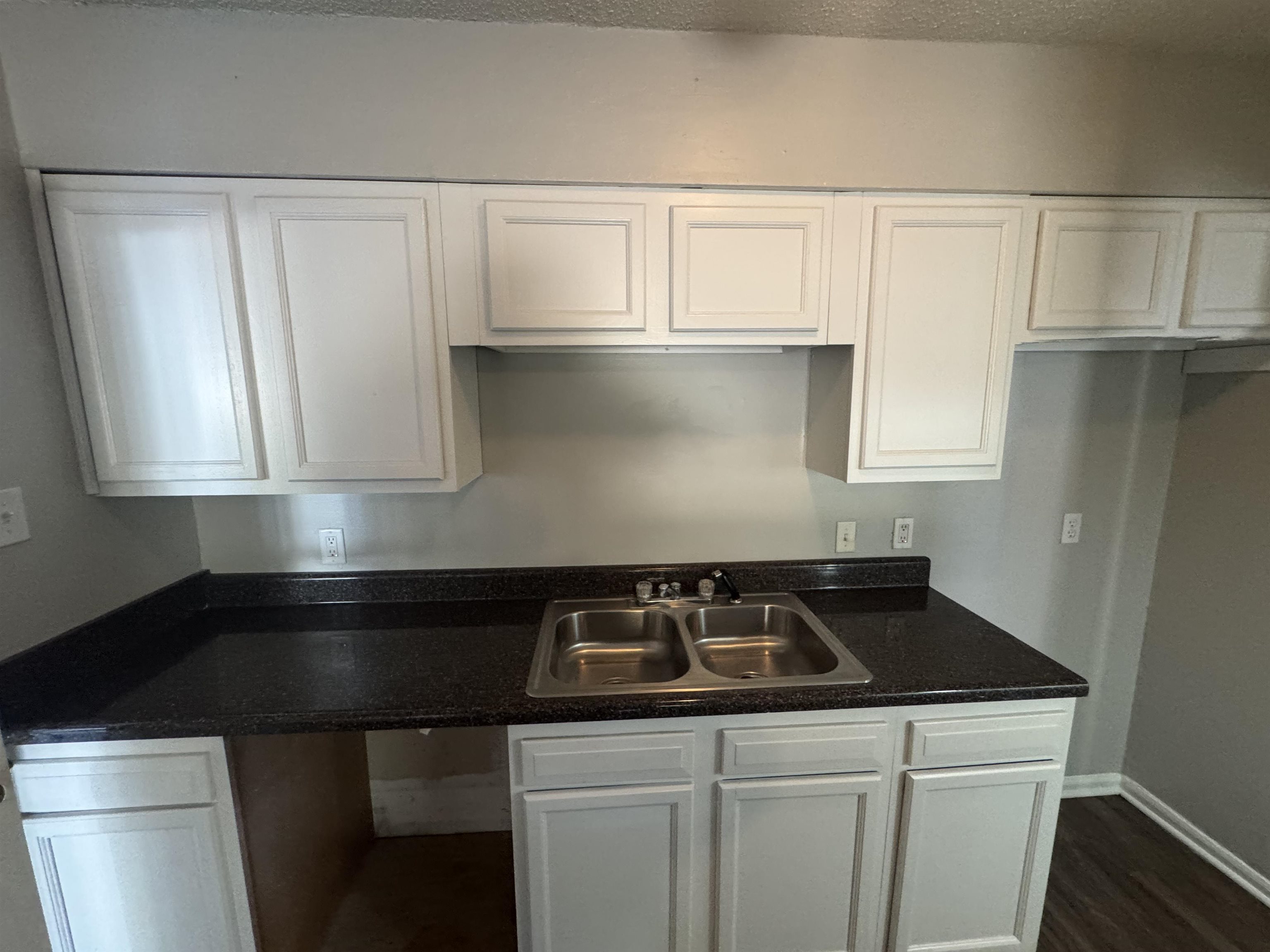 745 Harahan Road Memphis, TN 38109 - Photo 9 of 15 a kitchen with sink and cabinets