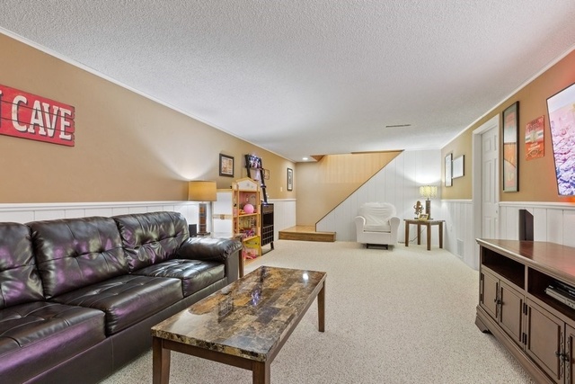 728 Schoolgate Road New Lenox, IL 60451 - Photo 18 of 24 a living room with furniture and a wooden floor