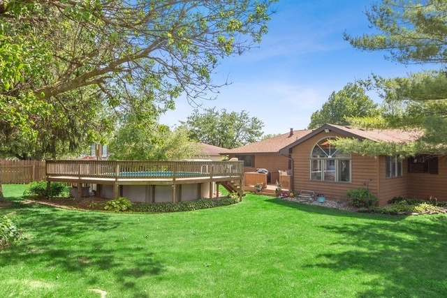 728 Schoolgate Road New Lenox, IL 60451 - Photo 20 of 24 a view of a house with a backyard and a garden