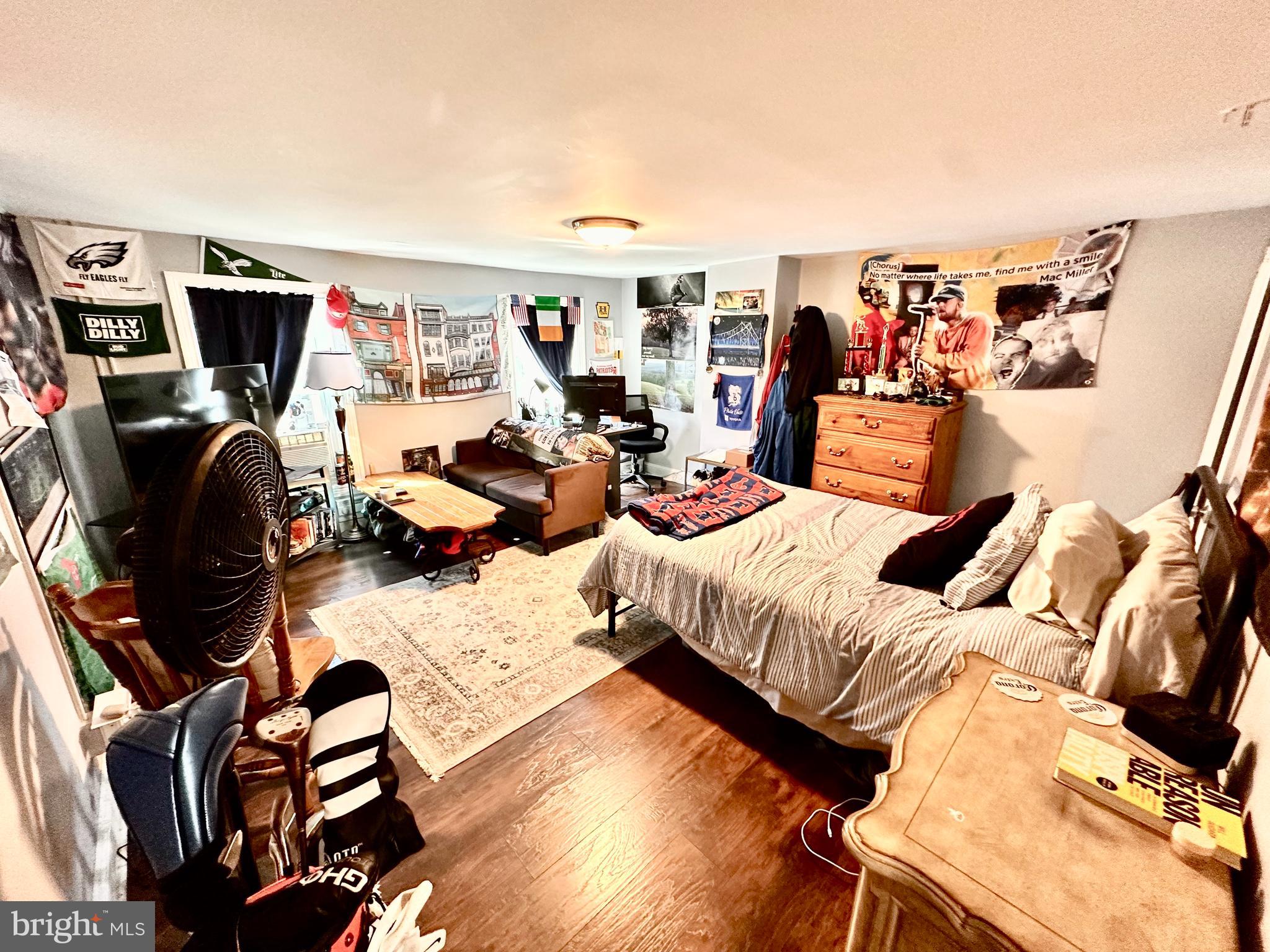 3652 Midvale Avenue, Unit 3 Philadelphia, PA 19129 - Photo 4 of 9 a living room with furniture and a flat screen tv