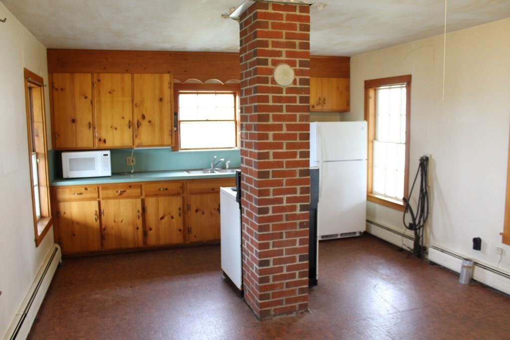 5 Wharf Road Penobscot, ME 04476 - Photo 11 of 35 Kitchen - this chimney is not...