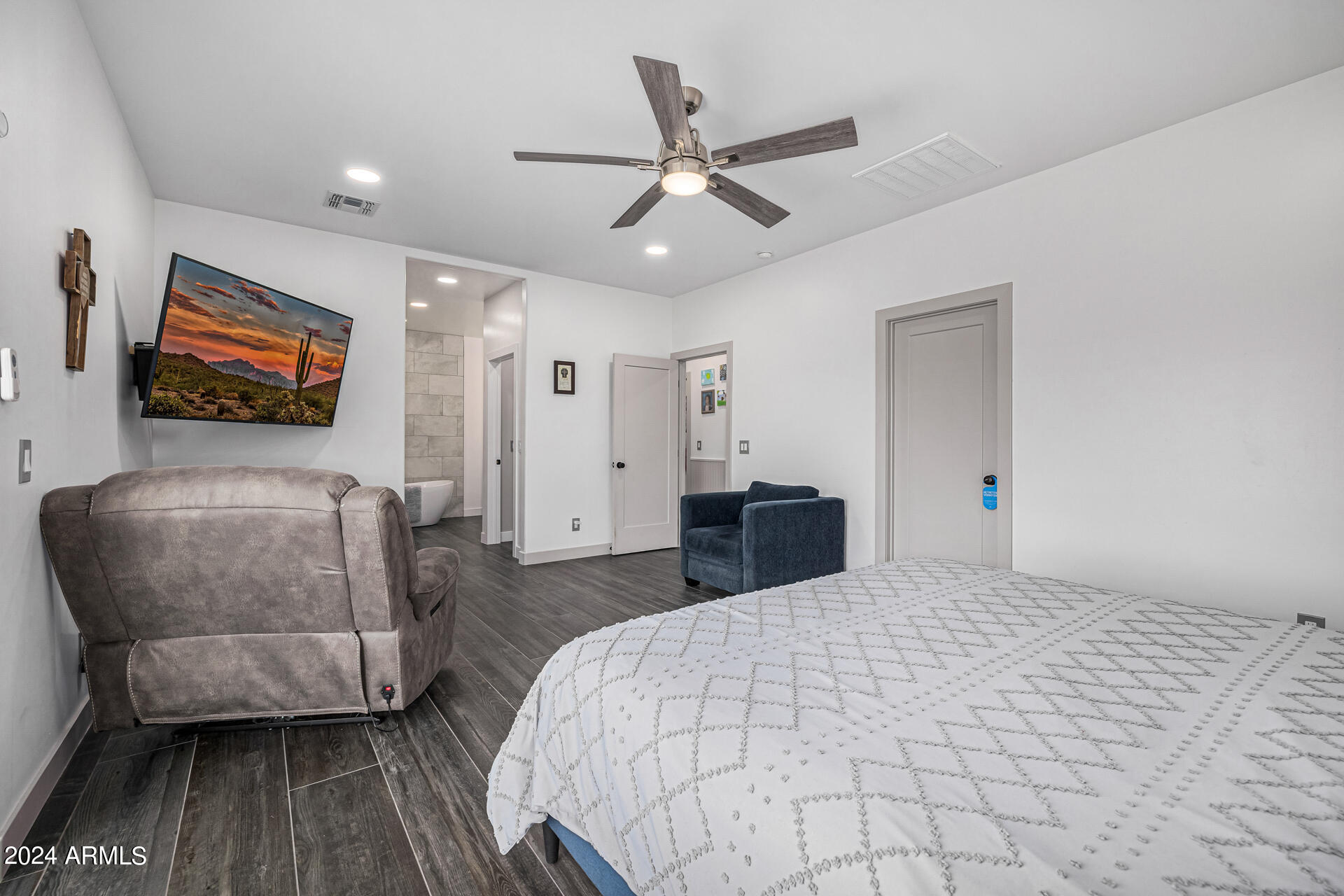1829 West Cloud Road Phoenix, AZ 85086 - Photo 31 of 137 a bedroom with a bed and a flat screen tv