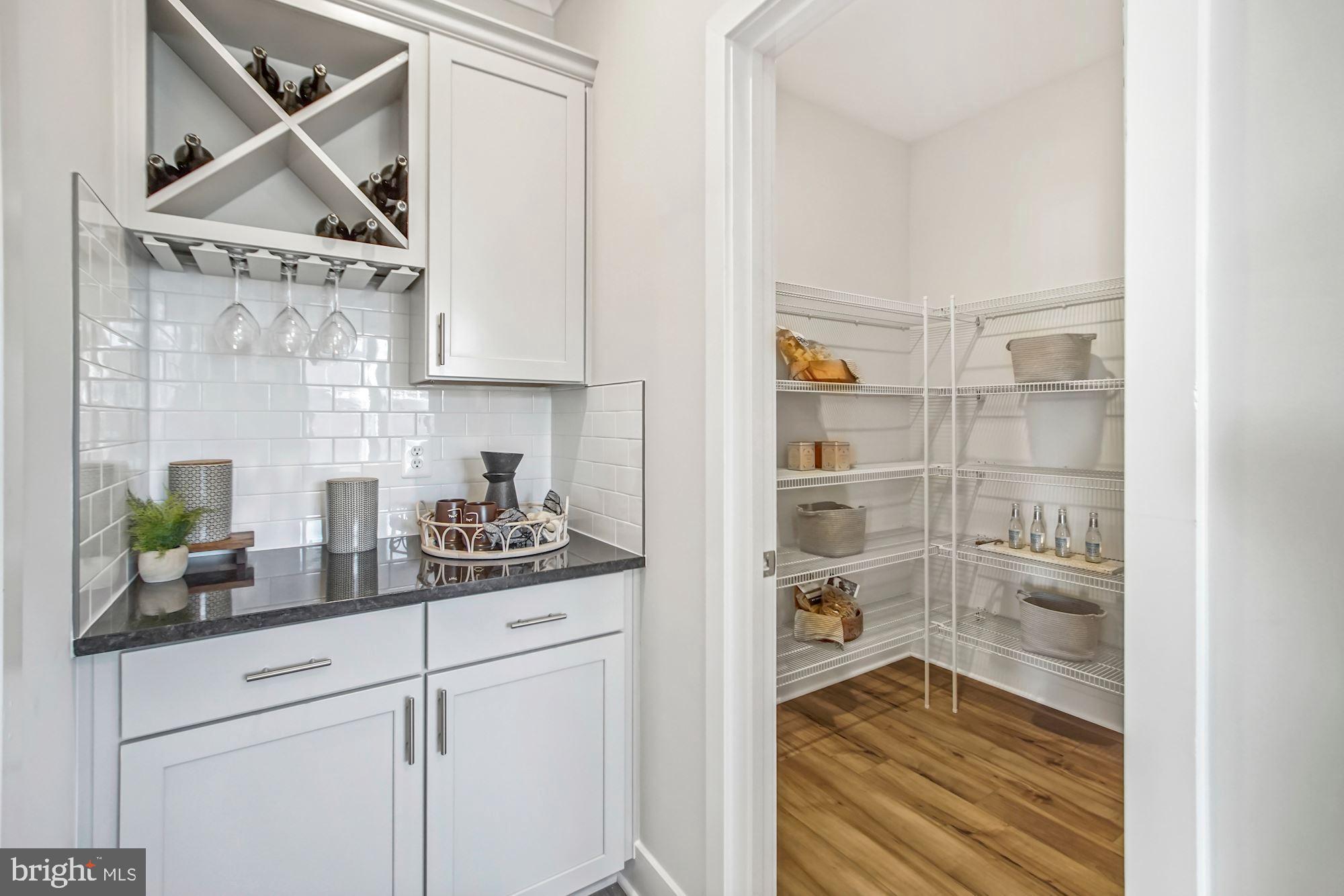 4151 Skipton Place White Plains, MD 20695 - Photo 12 of 27 a kitchen with a cabinets and window