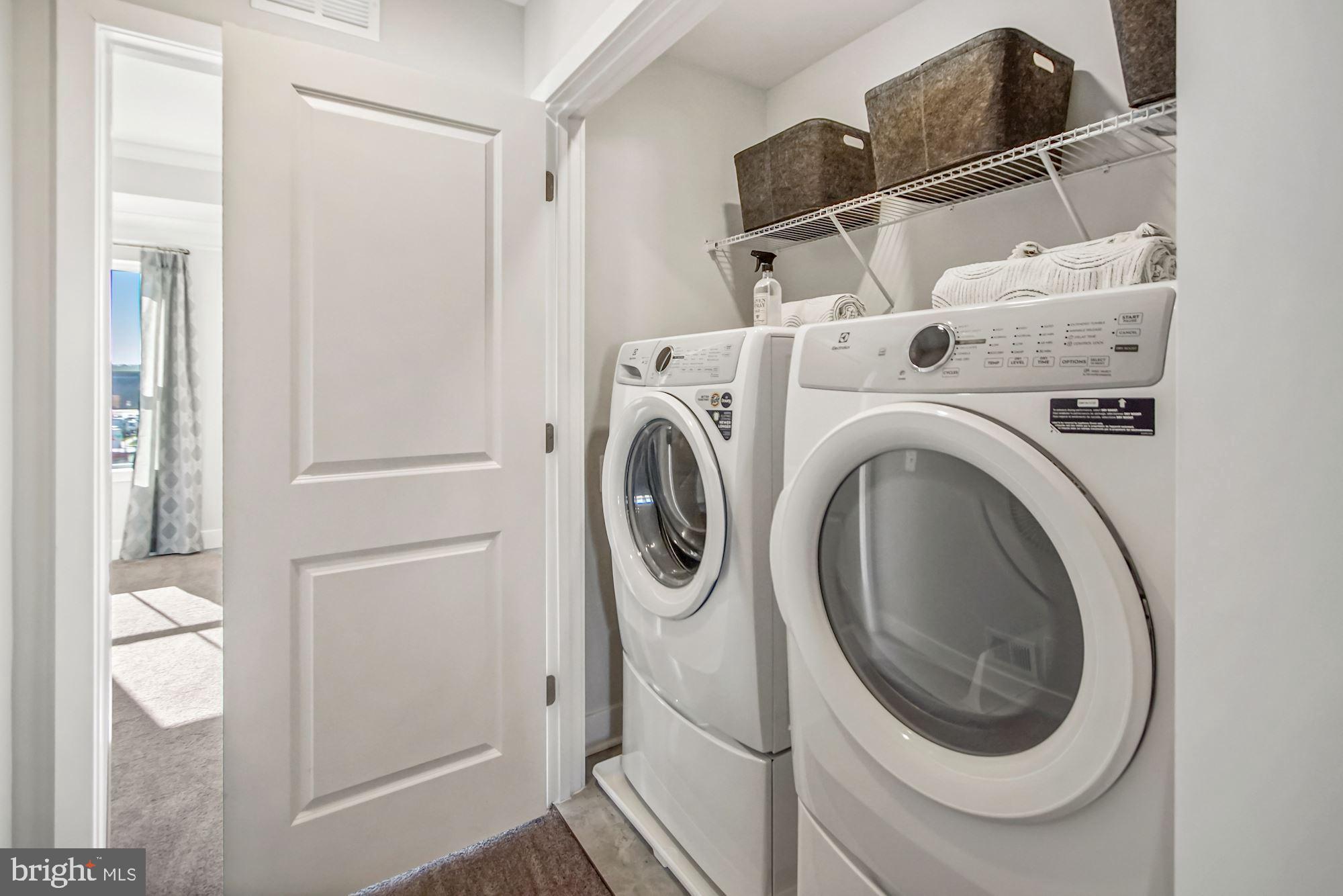 4151 Skipton Place White Plains, MD 20695 - Photo 13 of 27 a utility room with dryer and washer