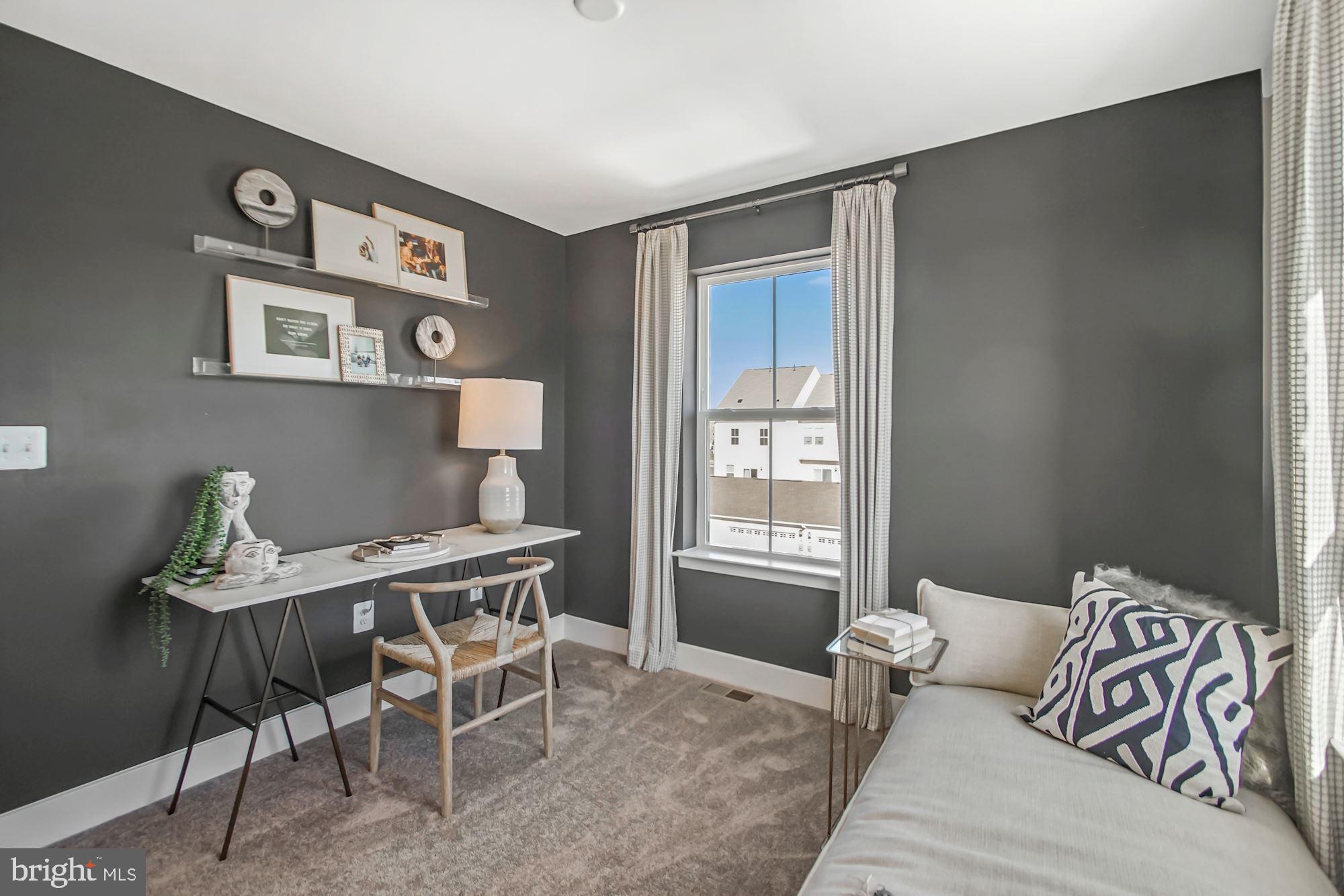 4151 Skipton Place White Plains, MD 20695 - Photo 14 of 27 a living room with furniture and a window