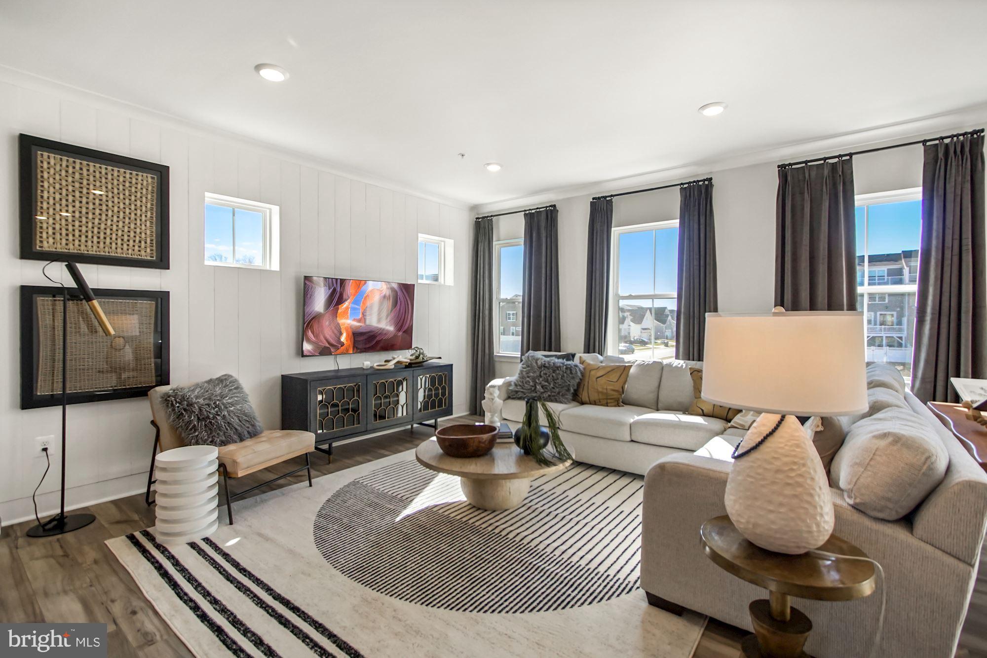 4151 Skipton Place White Plains, MD 20695 - Photo 5 of 27 a living room with furniture and a flat screen tv