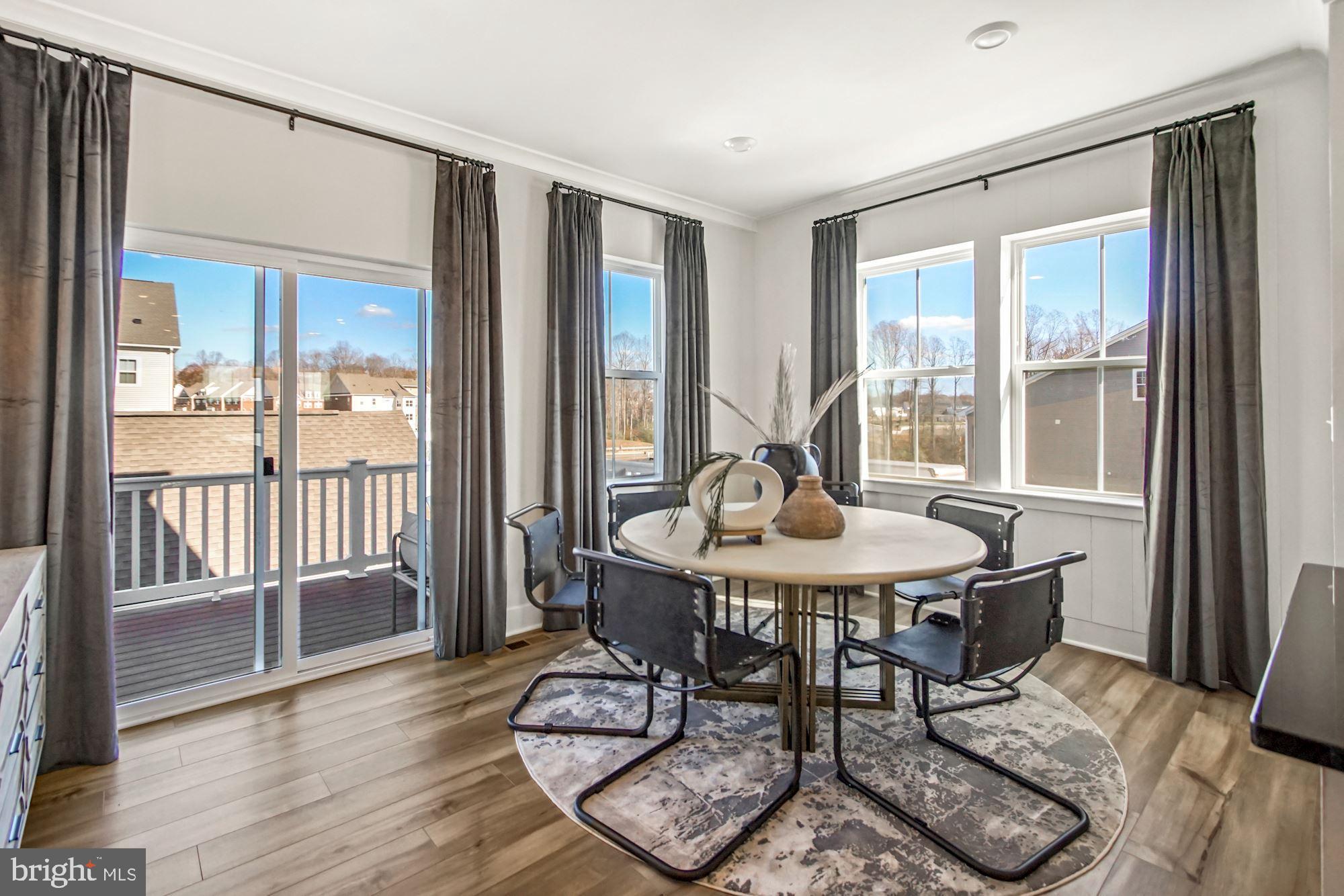 4151 Skipton Place White Plains, MD 20695 - Photo 9 of 27 a view of a livingroom with furniture and wooden floor
