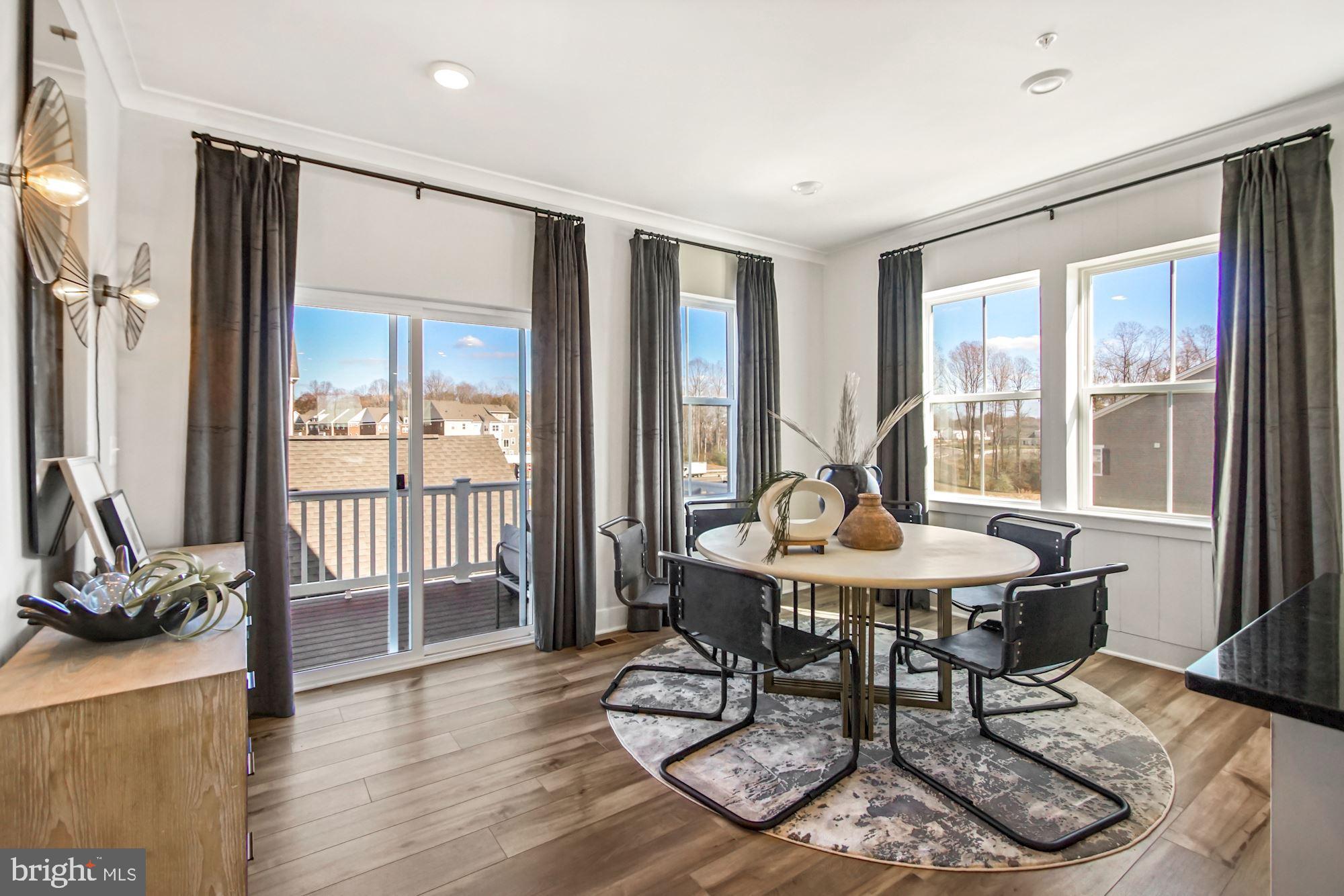 4151 Skipton Place White Plains, MD 20695 - Photo 10 of 27 a view of a livingroom with furniture and wooden floor