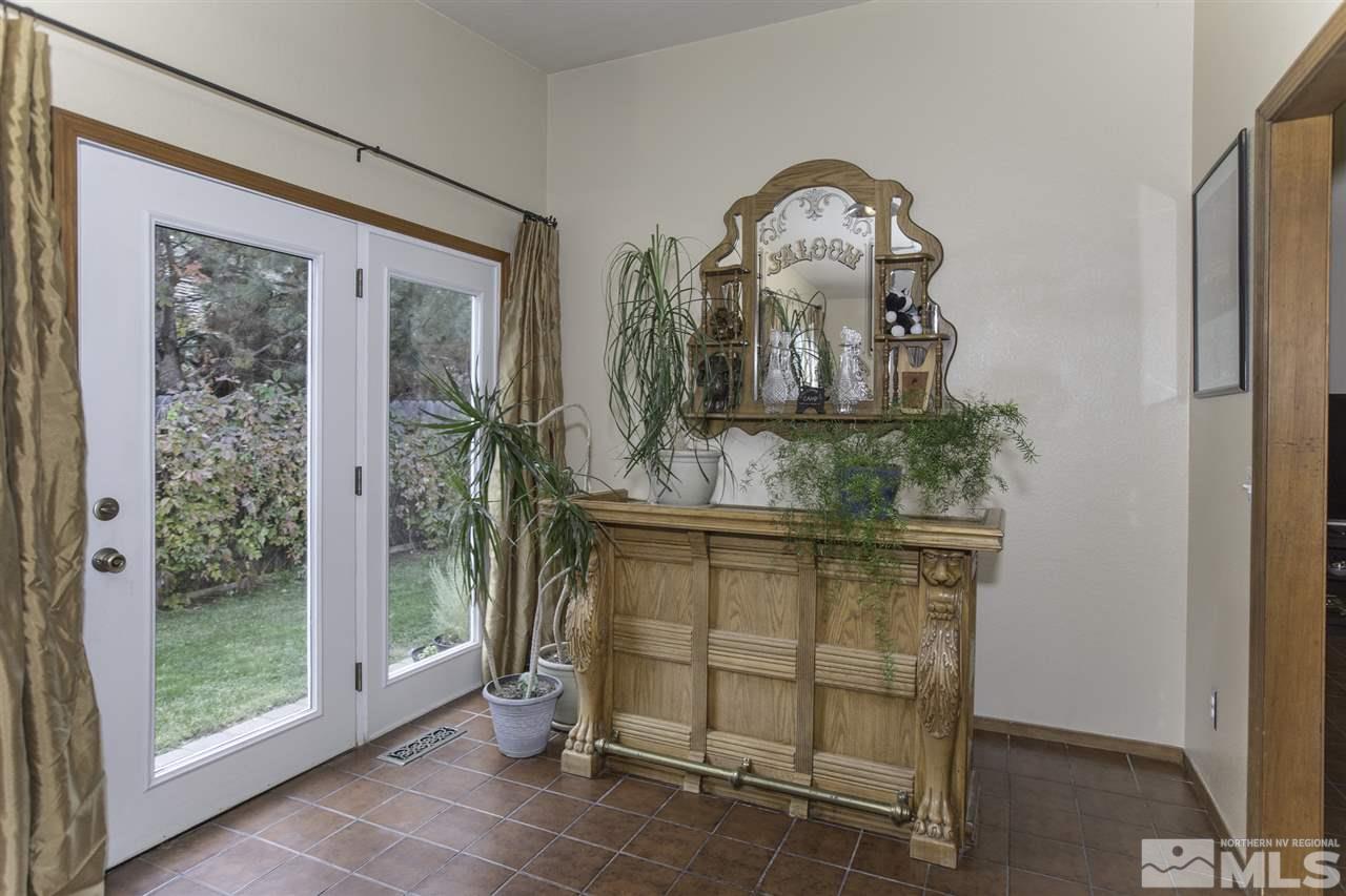 587 Creighton Way Reno, NV 89503 - Photo 16 of 25 a room with painting on the wall and a window