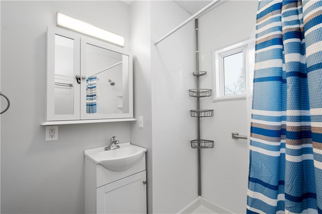 30 Evans Road Charleroi, PA 15022 - Photo 16 of 32 a bathroom with a sink and mirror
