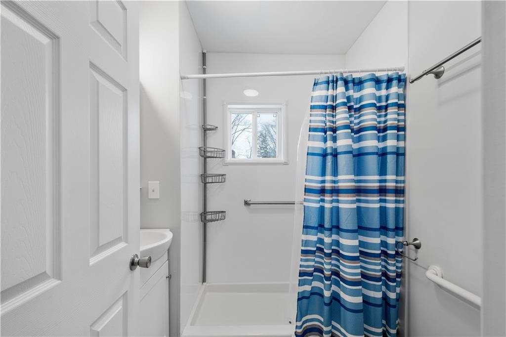 30 Evans Road Charleroi, PA 15022 - Photo 17 of 32 a view of a bathroom with a glass door shower and a sink