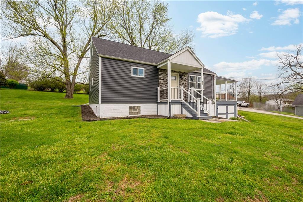 30 Evans Road Charleroi, PA 15022 - Photo 2 of 32 a front view of house with yard and outdoor seating