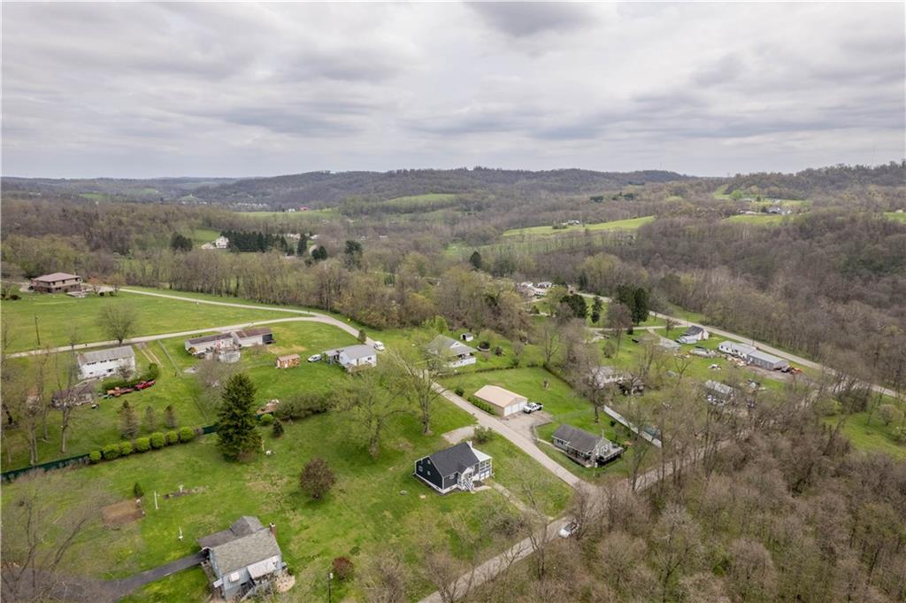 30 Evans Road Charleroi, PA 15022 - Photo 27 of 32 an aerial view of residential houses with outdoor space and trees