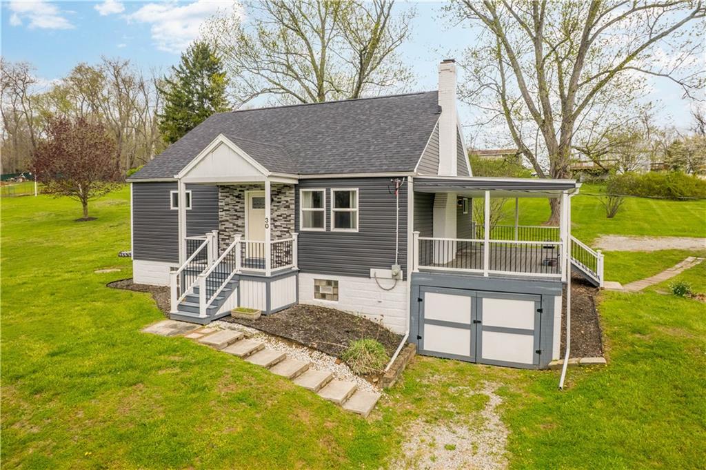 30 Evans Road Charleroi, PA 15022 - Photo 3 of 32 a view of a house with a patio and a yard