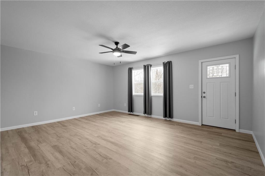 30 Evans Road Charleroi, PA 15022 - Photo 8 of 32 a view of an empty room with windows