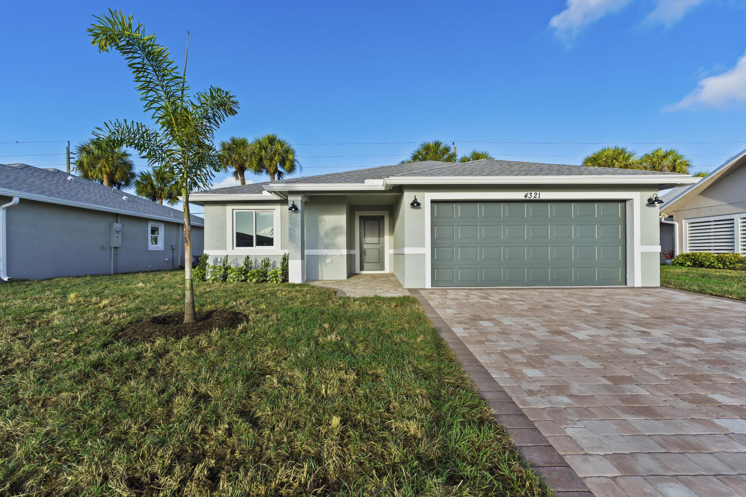 4321 Southwest 15th Way Okeechobee, FL 34974 - Photo 2 of 34 a house view with a backyard space