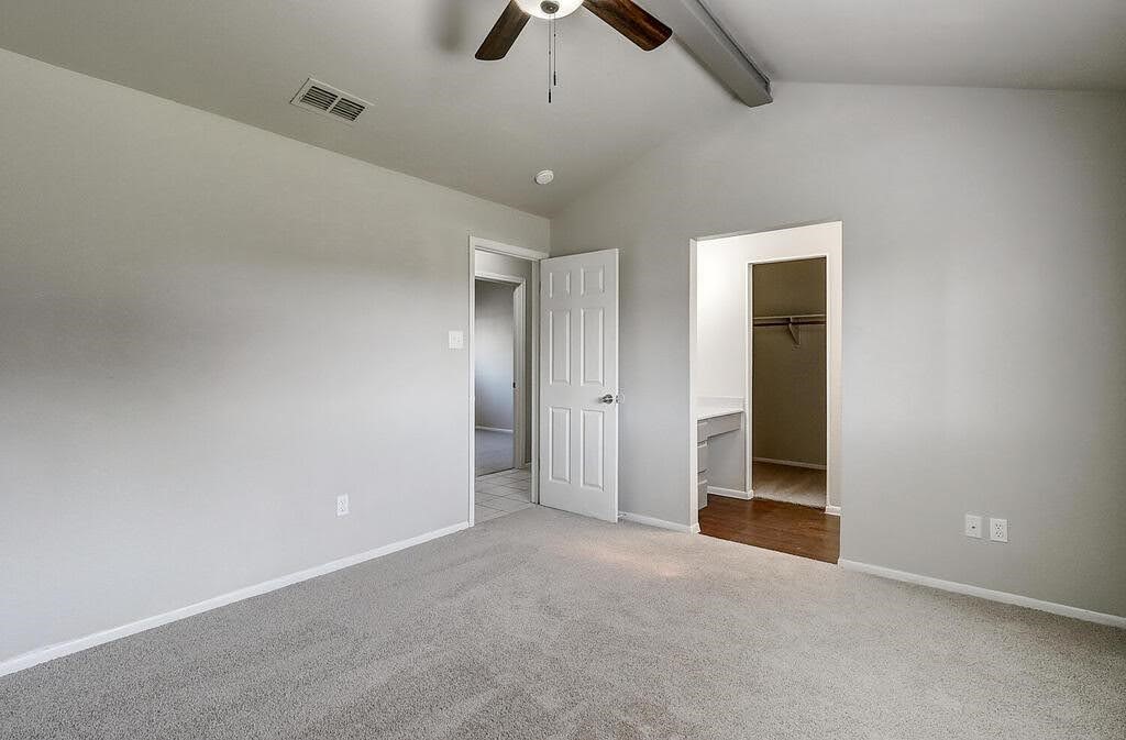 929 St Timothy Street Corpus Christi, TX 78418 - Photo 13 of 35 an empty room with chandelier fan and closet area
