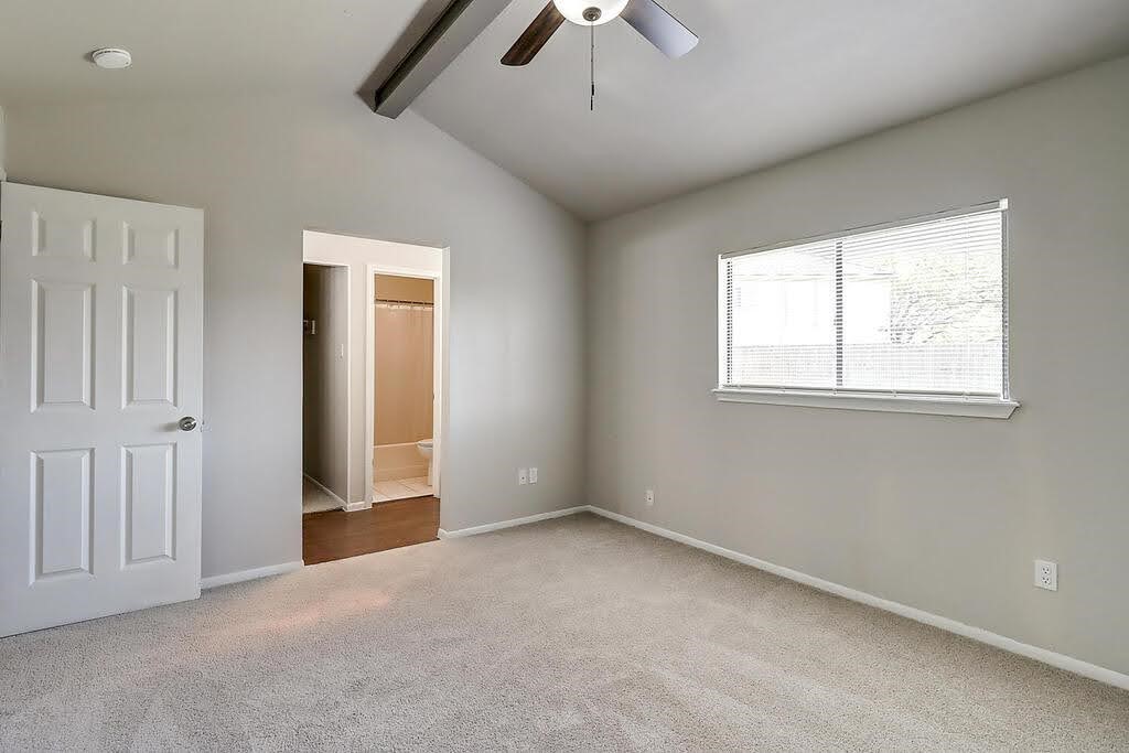 929 St Timothy Street Corpus Christi, TX 78418 - Photo 14 of 35 an empty room with chandelier fan and windows