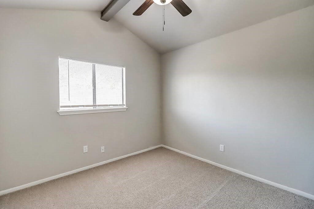 929 St Timothy Street Corpus Christi, TX 78418 - Photo 18 of 35 an empty room with chandelier fan and windows