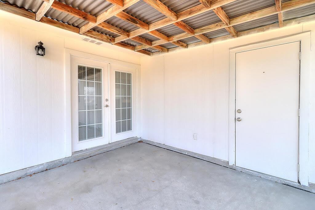 929 St Timothy Street Corpus Christi, TX 78418 - Photo 24 of 35 a view of empty room with windows