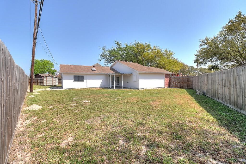 929 St Timothy Street Corpus Christi, TX 78418 - Photo 30 of 35 a house view with a garden space