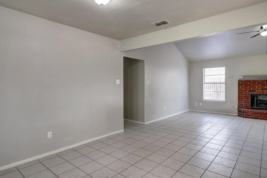 929 St Timothy Street Corpus Christi, TX 78418 - Photo 4 of 35 an empty room with windows