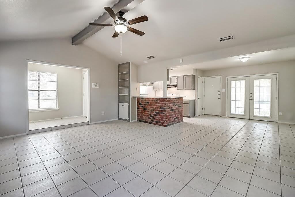 929 St Timothy Street Corpus Christi, TX 78418 - Photo 5 of 35 a view of empty room with window and ceiling fan