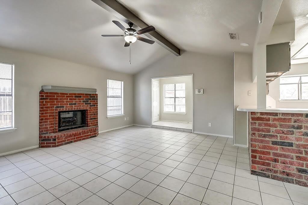 929 St Timothy Street Corpus Christi, TX 78418 - Photo 6 of 35 an empty room with windows and fireplace