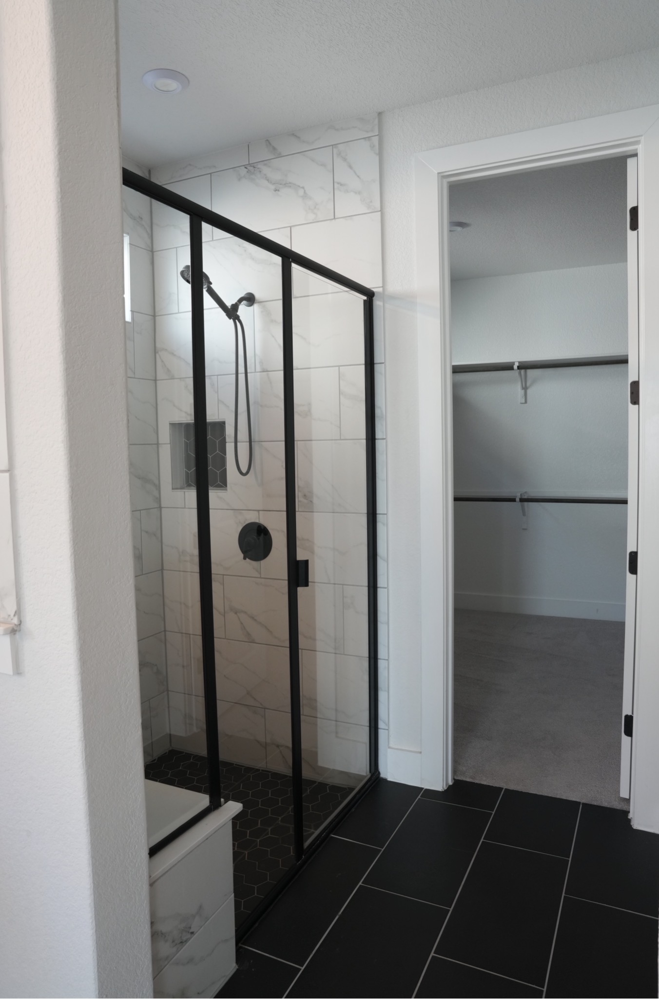 3812 Mercer Road Georgetown, TX 78628 - Photo 16 of 33 Bathroom featuring a shower stall and a walk in closet