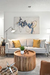 a living room with furniture and view