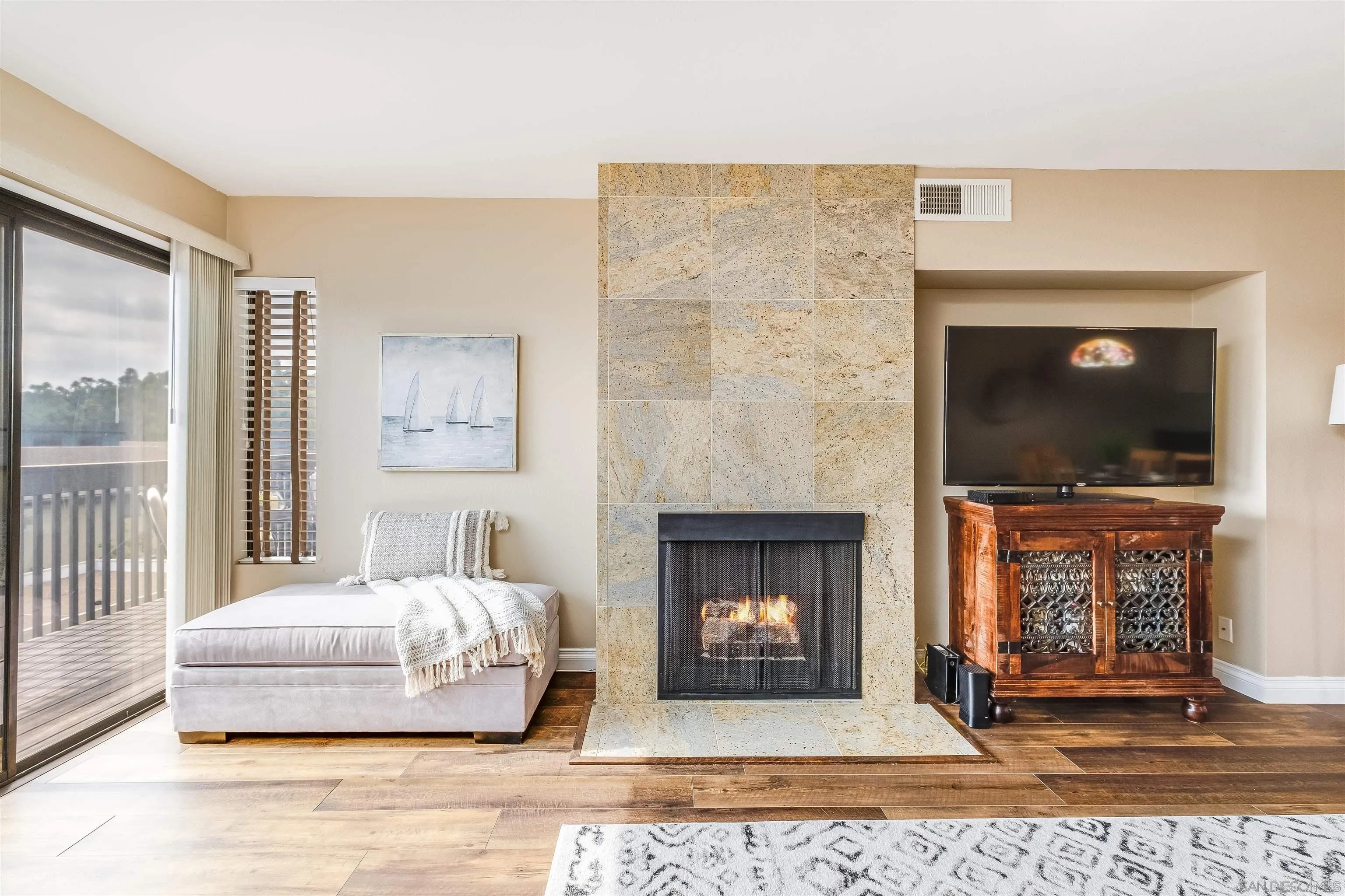 6379 Rancho Mission Road, Unit 4 San Diego, CA 92108 - Photo 3 of 22 a living room with furniture and a fireplace