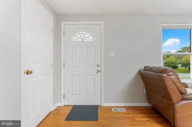 a view of livingroom with furniture and window