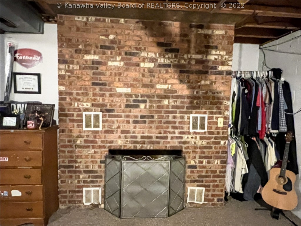 6490 Jericho Road Point Pleasant, WV 25550 - Photo 17 of 27 basement brick wood burning fireplace
