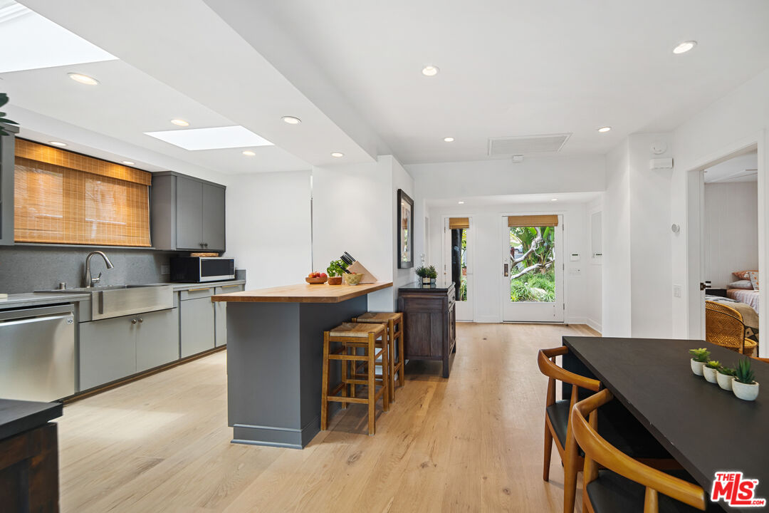 31008 Broad Beach Road Malibu, CA 90265 - Photo 16 of 41 a kitchen with a sink cabinets and window