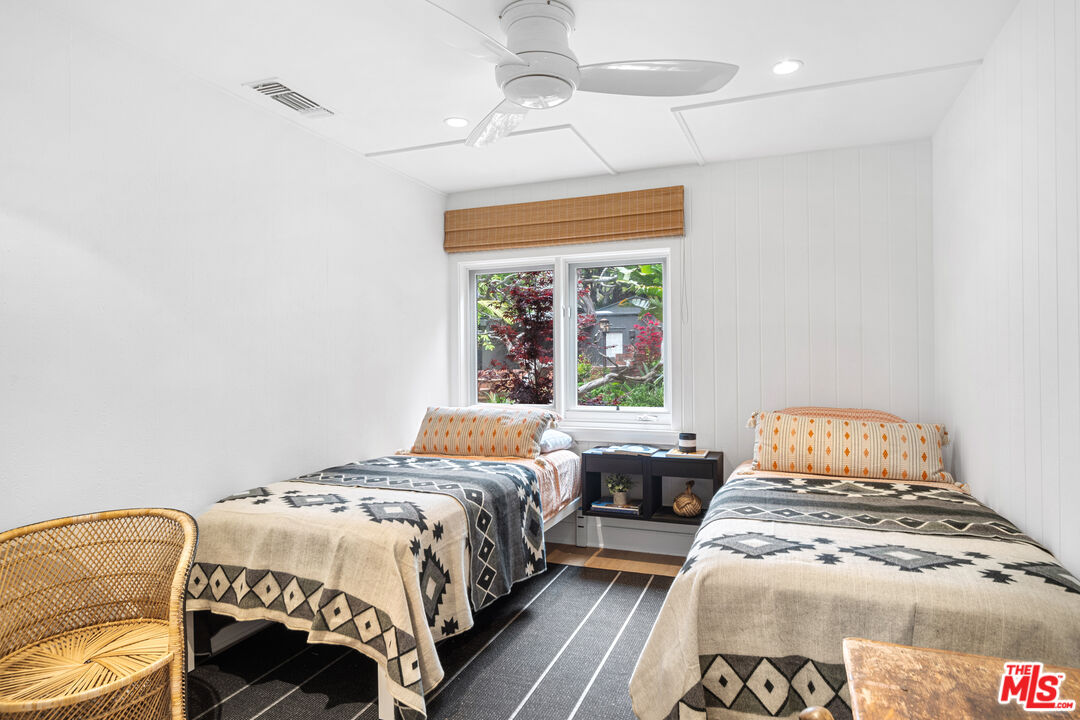 31008 Broad Beach Road Malibu, CA 90265 - Photo 35 of 41 a bedroom with a bed and a window