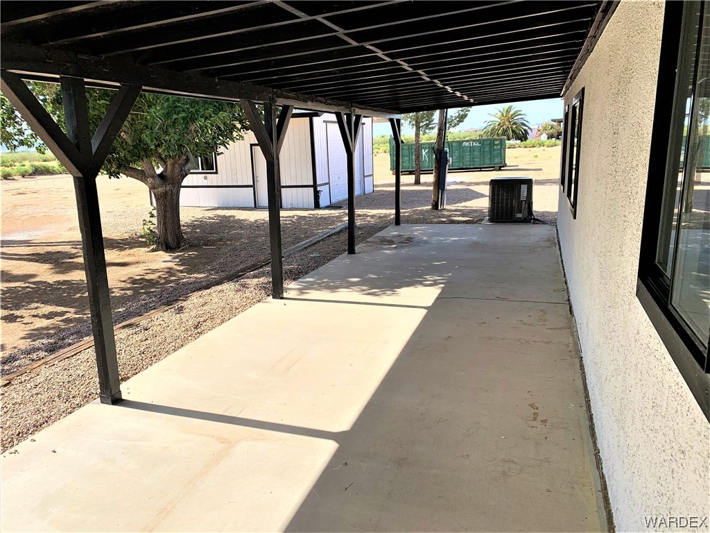 655 South Arivaca Road Golden Valley, AZ 86413 - Photo 25 of 29 a view of a porch