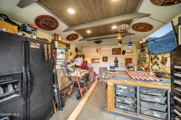 a view of a room with lots of shelves